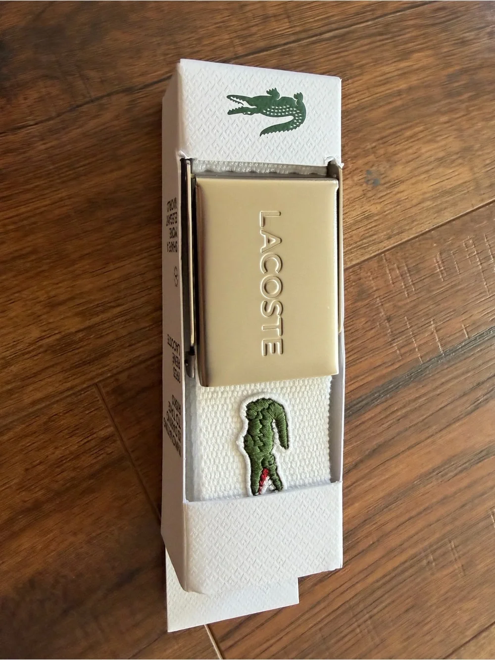 Lacoste white belt with green crocodile logo